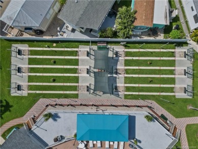 Waterfront Custom Built Home with 48 feet on a canal.  Carefree on Island Dunes Country Club in Florida - for sale on GolfHomes.com, golf home, golf lot