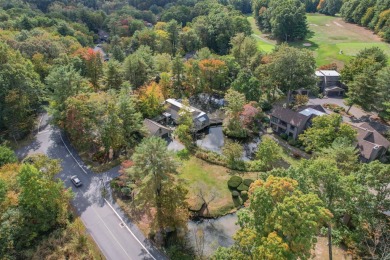 Welcome to 6 Woods Hollow Court, a bright and sunny end unit on Farmington Woods Country Club in Connecticut - for sale on GolfHomes.com, golf home, golf lot