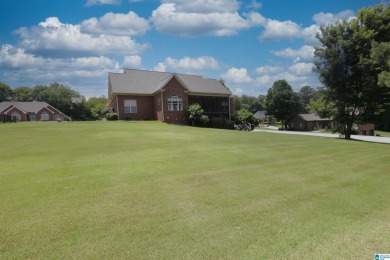 This absolute show stopper is situated on a large corner lot on Pine Hill Country Club in Alabama - for sale on GolfHomes.com, golf home, golf lot