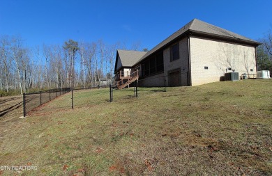 This Stunning blend of modern, luxury and nature on 2.2 acres of on Mountain Ridge Golf Club in Tennessee - for sale on GolfHomes.com, golf home, golf lot