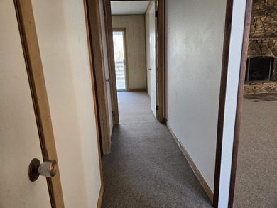 This wonderful 3 bedroom, 2 bath Cherokee Village home sits in a on Cherokee Village North Course in Arkansas - for sale on GolfHomes.com, golf home, golf lot