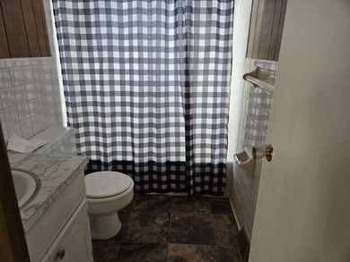 This wonderful 3 bedroom, 2 bath Cherokee Village home sits in a on Cherokee Village North Course in Arkansas - for sale on GolfHomes.com, golf home, golf lot