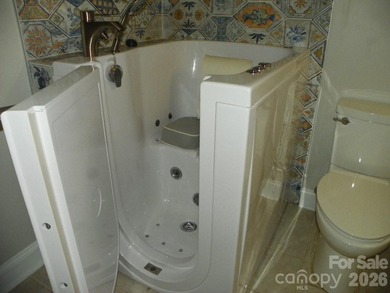 Located in the beautiful gated Golf Community of Uwharrie Point on Old North State Club at Uwharrie Point Golf community in North Carolina - for sale on GolfHomes.com, golf home, golf lot