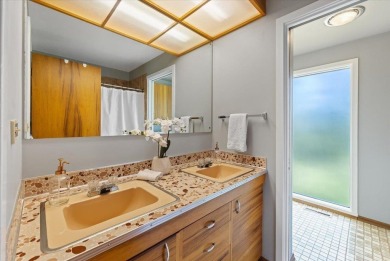 Discover this exceptional mid-century gem, designed by renowned on Spokane Country Club in Washington - for sale on GolfHomes.com, golf home, golf lot