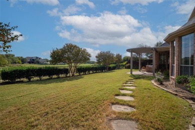 Experience exceptional golf course living in this elegant on The Trails of Frisco Golf Club in Texas - for sale on GolfHomes.com, golf home, golf lot