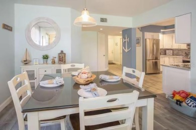 Welcome to your dream coastal retreat in Isla Del Sol!  This on Isla Del Sol Yacht and Country Club in Florida - for sale on GolfHomes.com, golf home, golf lot