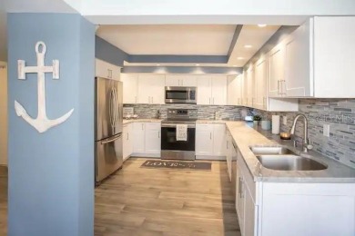 Welcome to your dream coastal retreat in Isla Del Sol!  This on Isla Del Sol Yacht and Country Club in Florida - for sale on GolfHomes.com, golf home, golf lot