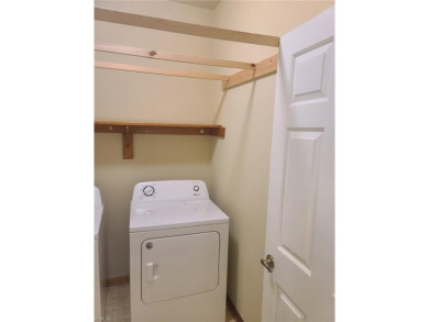 Three bedrooms upstairs, including two and a half bathrooms. The on Red Wing Lake Golf Course in Virginia - for sale on GolfHomes.com, golf home, golf lot