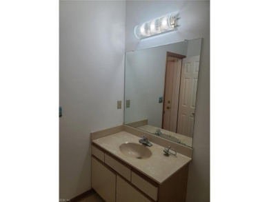 Three bedrooms upstairs, including two and a half bathrooms. The on Red Wing Lake Golf Course in Virginia - for sale on GolfHomes.com, golf home, golf lot