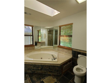 Three bedrooms upstairs, including two and a half bathrooms. The on Red Wing Lake Golf Course in Virginia - for sale on GolfHomes.com, golf home, golf lot