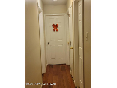 Experience the perfect blend of mountain serenity and modern on Pocono Farms Country Club in Pennsylvania - for sale on GolfHomes.com, golf home, golf lot