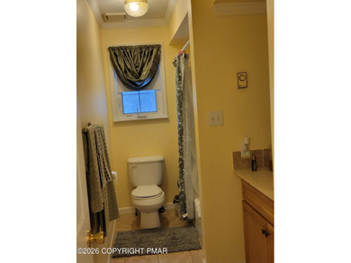 Experience the perfect blend of mountain serenity and modern on Pocono Farms Country Club in Pennsylvania - for sale on GolfHomes.com, golf home, golf lot