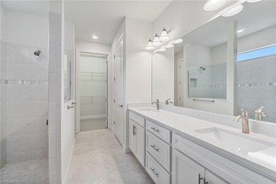 HEATED SALTWATER POOL WITH WATERFALL - EXPANDED LANAI - GOLF on River Hall Country Club in Florida - for sale on GolfHomes.com, golf home, golf lot
