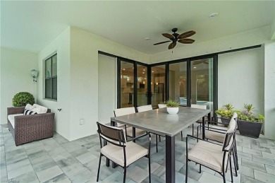 HEATED SALTWATER POOL WITH WATERFALL - EXPANDED LANAI - GOLF on River Hall Country Club in Florida - for sale on GolfHomes.com, golf home, golf lot