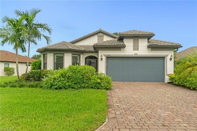 HEATED SALTWATER POOL WITH WATERFALL - EXPANDED LANAI - GOLF on River Hall Country Club in Florida - for sale on GolfHomes.com, golf home, golf lot