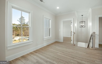 This stunning new-build estate home is set in a private on The Governors Towne Club in Georgia - for sale on GolfHomes.com, golf home, golf lot