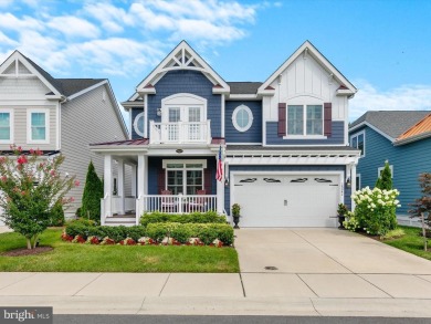Exquisite coastal-style home perfectly situated on a premium lot on The Peninsula Golf and Country Club in Delaware - for sale on GolfHomes.com, golf home, golf lot