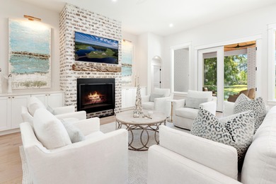 Welcome to 228 Matties Way, an exquisite lakefront retreat that on Kelly Plantation Golf Club in Florida - for sale on GolfHomes.com, golf home, golf lot