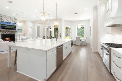 Welcome to 228 Matties Way, an exquisite lakefront retreat that on Kelly Plantation Golf Club in Florida - for sale on GolfHomes.com, golf home, golf lot