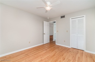 Light, bright, and beautiful end-unit condo with gorgeous golf on Cross Creek Country Club in Florida - for sale on GolfHomes.com, golf home, golf lot