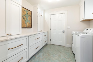 Welcome to 228 Matties Way, an exquisite lakefront retreat that on Kelly Plantation Golf Club in Florida - for sale on GolfHomes.com, golf home, golf lot