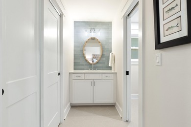 Welcome to 228 Matties Way, an exquisite lakefront retreat that on Kelly Plantation Golf Club in Florida - for sale on GolfHomes.com, golf home, golf lot