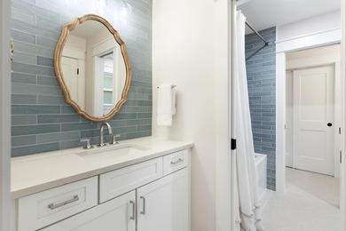 Welcome to 228 Matties Way, an exquisite lakefront retreat that on Kelly Plantation Golf Club in Florida - for sale on GolfHomes.com, golf home, golf lot