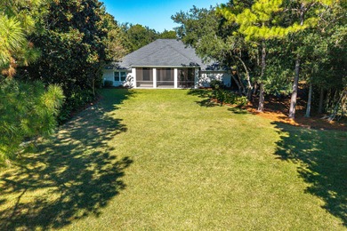Welcome to 228 Matties Way, an exquisite lakefront retreat that on Kelly Plantation Golf Club in Florida - for sale on GolfHomes.com, golf home, golf lot
