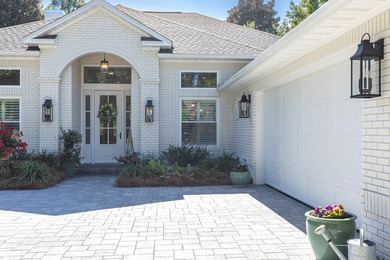 Welcome to 228 Matties Way, an exquisite lakefront retreat that on Kelly Plantation Golf Club in Florida - for sale on GolfHomes.com, golf home, golf lot