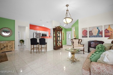 Light-Filled One-Level End Unit in Sun City! Tucked in a quiet on Okatie Creek Golf Club in South Carolina - for sale on GolfHomes.com, golf home, golf lot