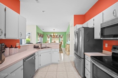 Light-Filled One-Level End Unit in Sun City! Tucked in a quiet on Okatie Creek Golf Club in South Carolina - for sale on GolfHomes.com, golf home, golf lot