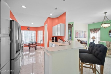 Light-Filled One-Level End Unit in Sun City! Tucked in a quiet on Okatie Creek Golf Club in South Carolina - for sale on GolfHomes.com, golf home, golf lot
