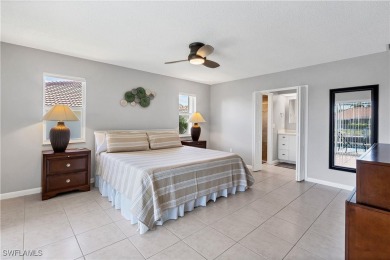 This immaculate waterfront canal pool home with gulf-access is on Saint Andrews South Golf Club in Florida - for sale on GolfHomes.com, golf home, golf lot