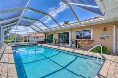 This immaculate waterfront canal pool home with gulf-access is on Saint Andrews South Golf Club in Florida - for sale on GolfHomes.com, golf home, golf lot