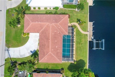 This immaculate waterfront canal pool home with gulf-access is on Saint Andrews South Golf Club in Florida - for sale on GolfHomes.com, golf home, golf lot