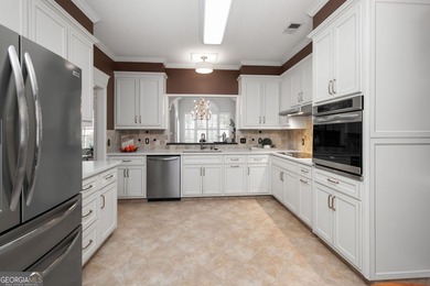 Master on the Main home offers timeless elegance, and a private on Braelinn Golf Club in Georgia - for sale on GolfHomes.com, golf home, golf lot