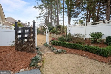 Master on the Main home offers timeless elegance, and a private on Braelinn Golf Club in Georgia - for sale on GolfHomes.com, golf home, golf lot