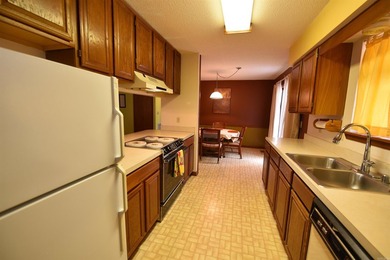 A RARE FIND, a modestly priced 2-bedroom, 2-bathroom home with a on Mountain Ranch Golf Club in Arkansas - for sale on GolfHomes.com, golf home, golf lot