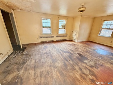 60 Hubbard Rd. offers a solid opportunity for buyers, investors on Goodwin Golf Course in Connecticut - for sale on GolfHomes.com, golf home, golf lot