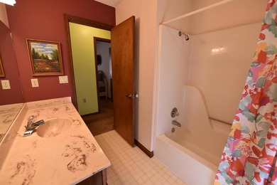 A RARE FIND, a modestly priced 2-bedroom, 2-bathroom home with a on Mountain Ranch Golf Club in Arkansas - for sale on GolfHomes.com, golf home, golf lot