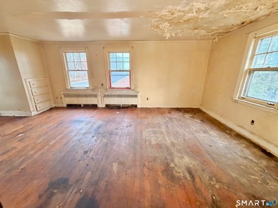 60 Hubbard Rd. offers a solid opportunity for buyers, investors on Goodwin Golf Course in Connecticut - for sale on GolfHomes.com, golf home, golf lot