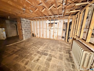 60 Hubbard Rd. offers a solid opportunity for buyers, investors on Goodwin Golf Course in Connecticut - for sale on GolfHomes.com, golf home, golf lot