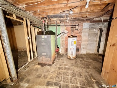 60 Hubbard Rd. offers a solid opportunity for buyers, investors on Goodwin Golf Course in Connecticut - for sale on GolfHomes.com, golf home, golf lot