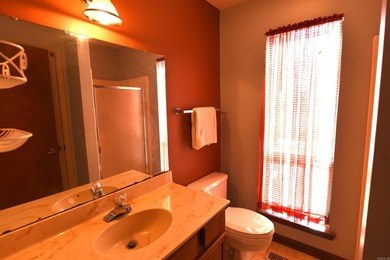 A RARE FIND, a modestly priced 2-bedroom, 2-bathroom home with a on Mountain Ranch Golf Club in Arkansas - for sale on GolfHomes.com, golf home, golf lot