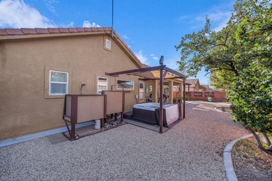 Charming 3-bedroom, 2-bath home in Hurricane offering 1,613 sq on Sky Mountain Golf Course in Utah - for sale on GolfHomes.com, golf home, golf lot