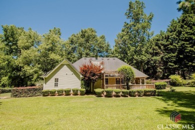 This warm & welcoming 3 bedroom/2 bathroom ranch home is nestled on Bear Creek Golf Club Inc in Georgia - for sale on GolfHomes.com, golf home, golf lot