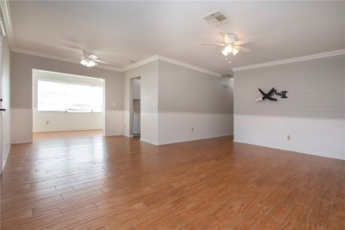 Welcome to your perfect slice of paradise in the heart of Kings on Kings Point Executive Golf Course in Florida - for sale on GolfHomes.com, golf home, golf lot