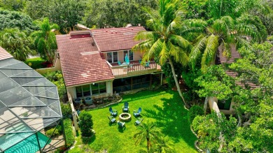 Stunning two story single family home nestled in the sought on Deer Creek Golf Club in Florida - for sale on GolfHomes.com, golf home, golf lot