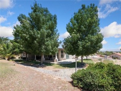 Welcome to this elegant residence located at 12926 Cedarbrook on Spring Valley Lake Country Club in California - for sale on GolfHomes.com, golf home, golf lot