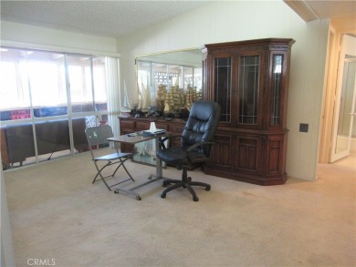 Don't miss out on this two-bedroom one-bathroom home with a on Leisure World Seal Beach Golf Course in California - for sale on GolfHomes.com, golf home, golf lot